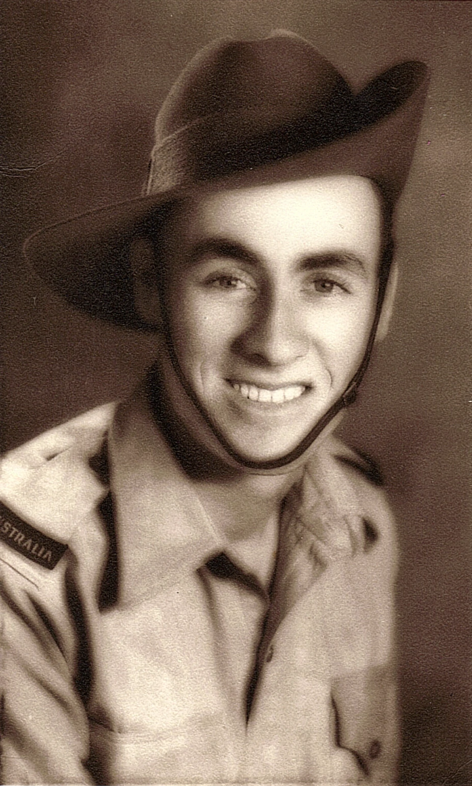 Sepia photo of Private Kevin Biddle, QX42630 Unit 2/2 AGH WW2 father of the inventor of the EMB Military Helmet.